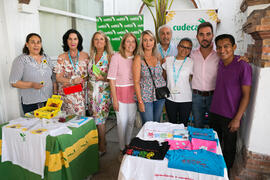 Stands de las fundaciones CUDECA y Acoes Honduras. Festival benéfico en los Baños del Carmen. Cursos de Verano de la Universidad de Málaga. Málaga. Julio de 2018