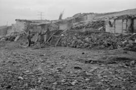 Chabolas destrozadas como consecuencia del temporal de viento en las playas de El Bulto y San Andrés. Málaga. Enero de 1963