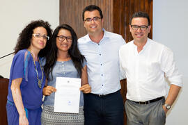 Cristina Ortega, Antonio Hierro y Álvaro García con una alumna en su graduación. Centro Internacional de Español. Julio de 2014
