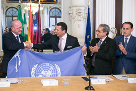 Entrega de la bandera de la ONU. Presentación del Centro Internacional de Autoridades y Líderes. Ayuntamiento de Málaga. Julio de 2018