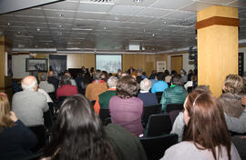 Javier Ramírez impartiendo una conferencia en la presentación de "Málaga en el punto de mira. Relato fotográfico del siglo XX". Ámbito Cultural de El Corte Inglés. Diciembre, 2014.